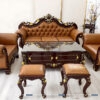 Bộ sofa tân cổ điển giá rẻ gồm 1 văng dài 2m2, 2 ghế đơn 1m, 1 bàn trà 1m2 và 2 đôn nhỏ, màu cà phê, hoa văn nhũ vàng sang trọng