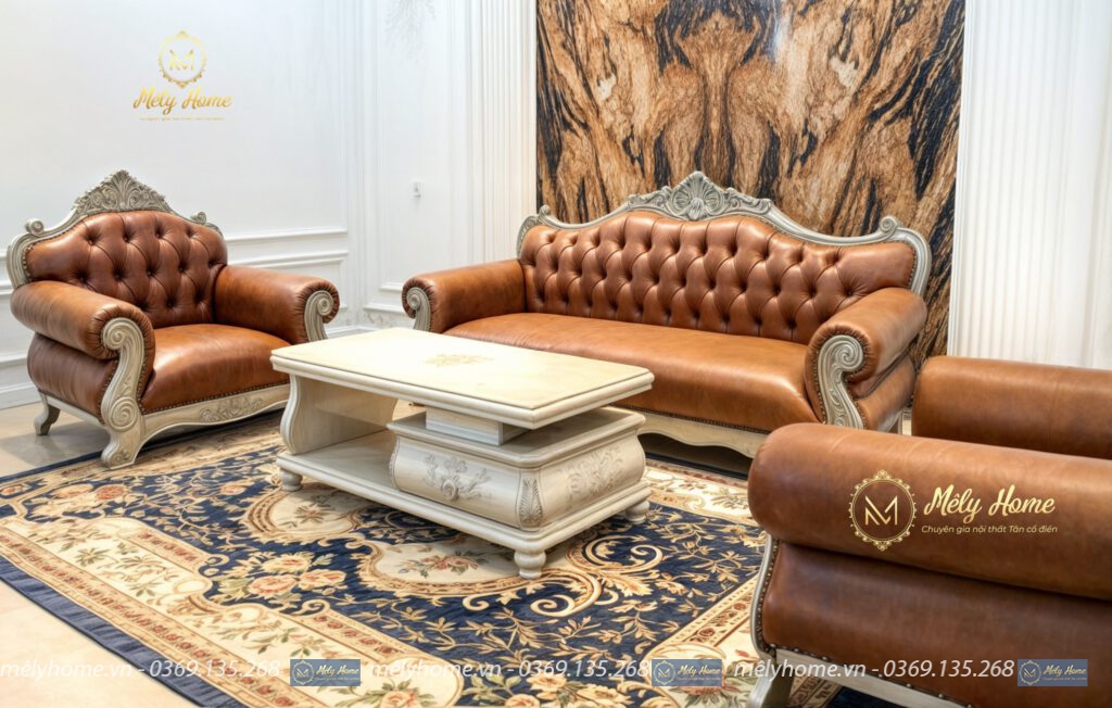 Bộ sofa tân cổ điển dòng cao cấp với khung gỗ tự nhiên và da bò thật, gồm văng dài 2m2, 2 ghế đơn 1m và bàn trà 1m2
