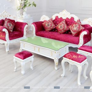 Bộ sofa tân cổ điển giá rẻ khung màu trắng, bọc nhung màu đỏ nổi bật, gồm 1 văng dài, 1 ghế đơn, 1 bàn trà và 3 đôn nhỏ