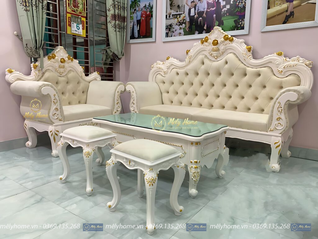 Bộ sofa giá rẻ phong cách tân cổ điển màu kem, gồm văng dài 2m, bàn trà 1m2, ghế đơn 1m, kèm 2 đôn nhỏ