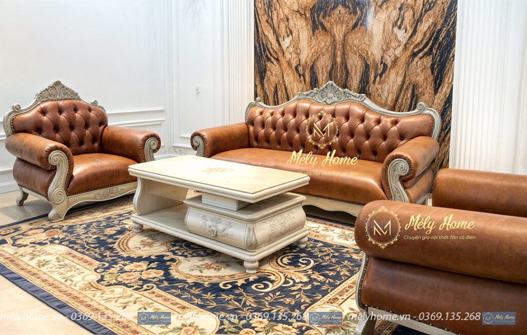 Bộ sofa tân cổ điển dòng cao cấp với khung gỗ tự nhiên và da bò thật, gồm văng dài 2m2, 2 ghế đơn 1m và bàn trà 1m2
