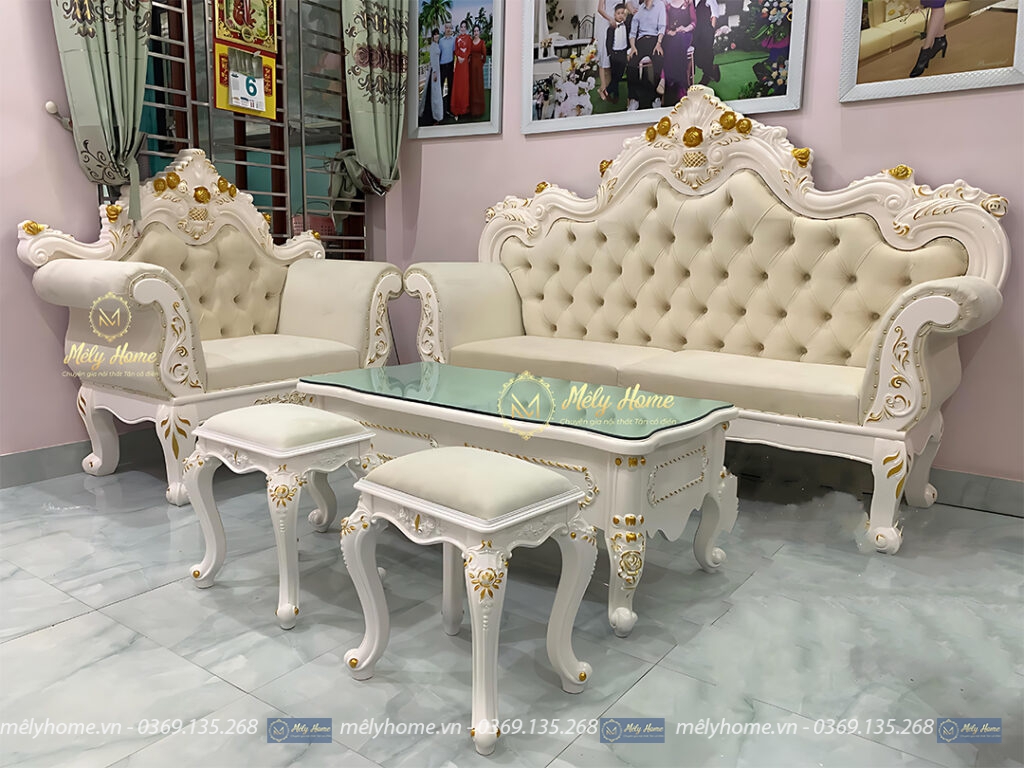 Bộ sofa giá rẻ phong cách tân cổ điển màu kem, gồm văng dài 2m, bàn trà 1m2, ghế đơn 1m, kèm 2 đôn nhỏ